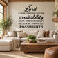 Black wall decal with script "The Lord" and quote about availability and possibilities