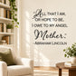 Black script wall decal with quote: “All that I am, or hope to be, I owe…”.