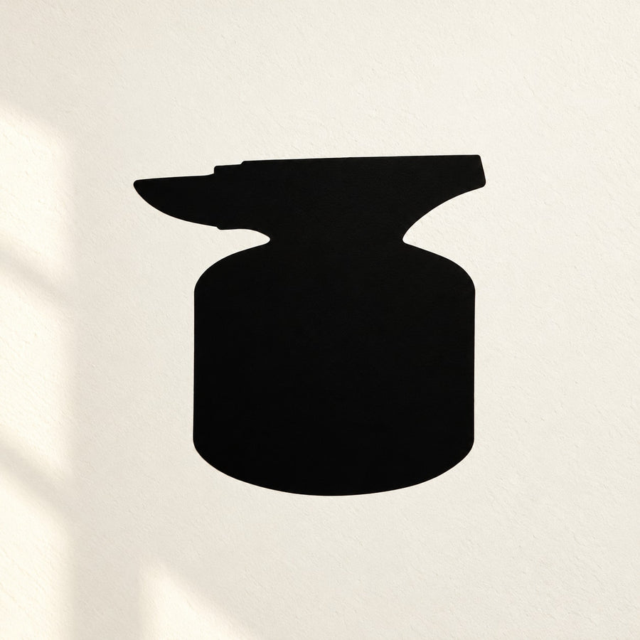 Black anvil on log silhouette wall decal