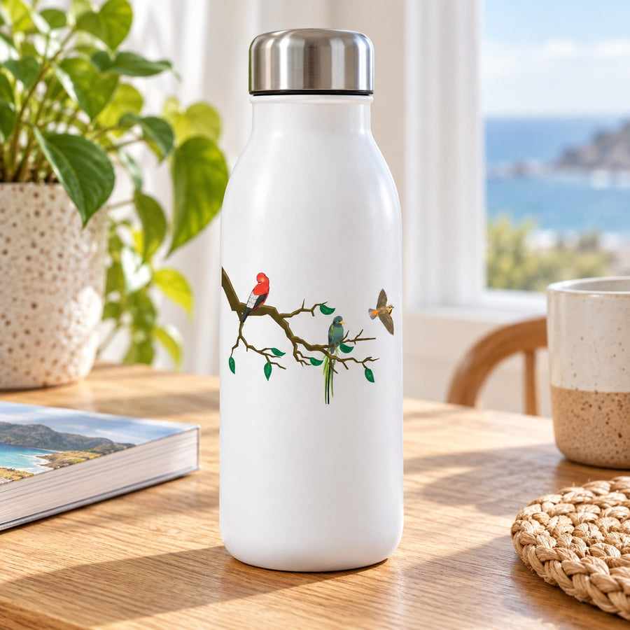 Tree branch stickers with colorful birds on a branch, applied to a white bottle