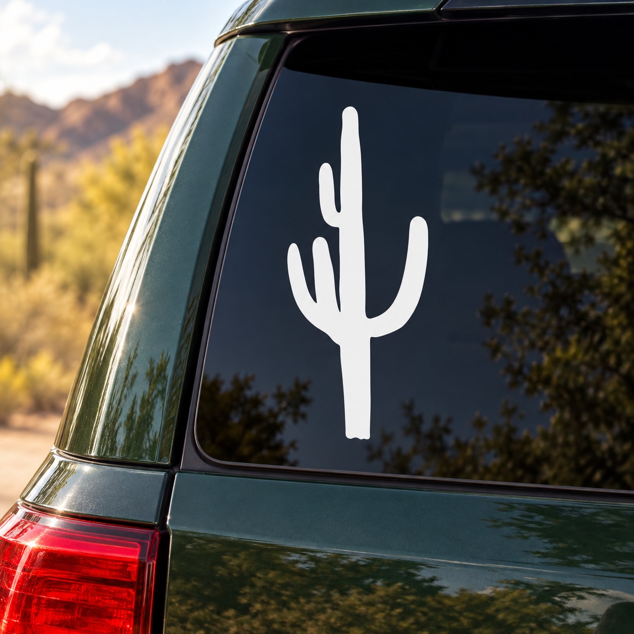 Saguaro cactus decal with a white cactus silhouette on a car window