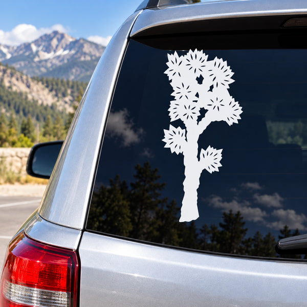 White tree vinyl decal on car rear window