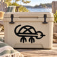 Minimal turtle symbol decal, black on light-colored cooler