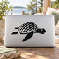 Black striped sea turtle decal on a white laptop lid