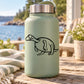 Cartoon turtle outline decal, black line art on a light green bottle