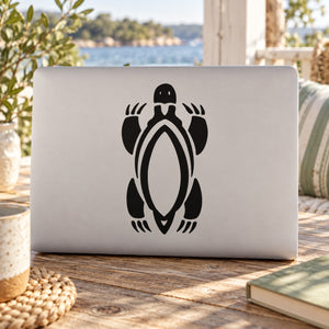 Black abstract turtle with claws decal on light background