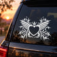 White ornamental heart with wings decal on car rear window
