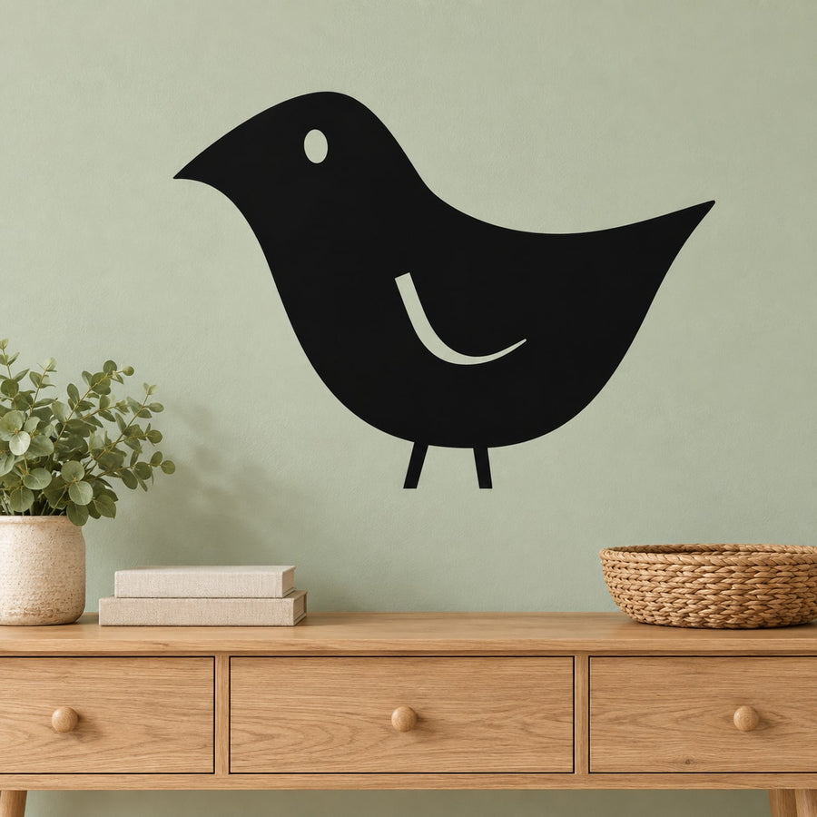 Black bird chick wall decal with white eye and curved beak