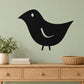 Black bird chick wall decal with white eye and curved beak