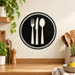 Black circular wall decal with fork, knife, and spoon icons