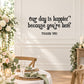 Cursive quote wall decal: “Our day is happier because you’re here.”