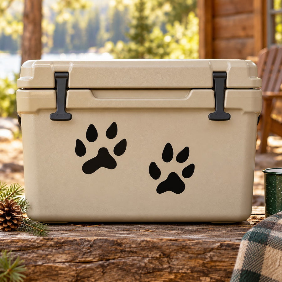 Black weasel paw print decal set on a light-colored cooler lid
