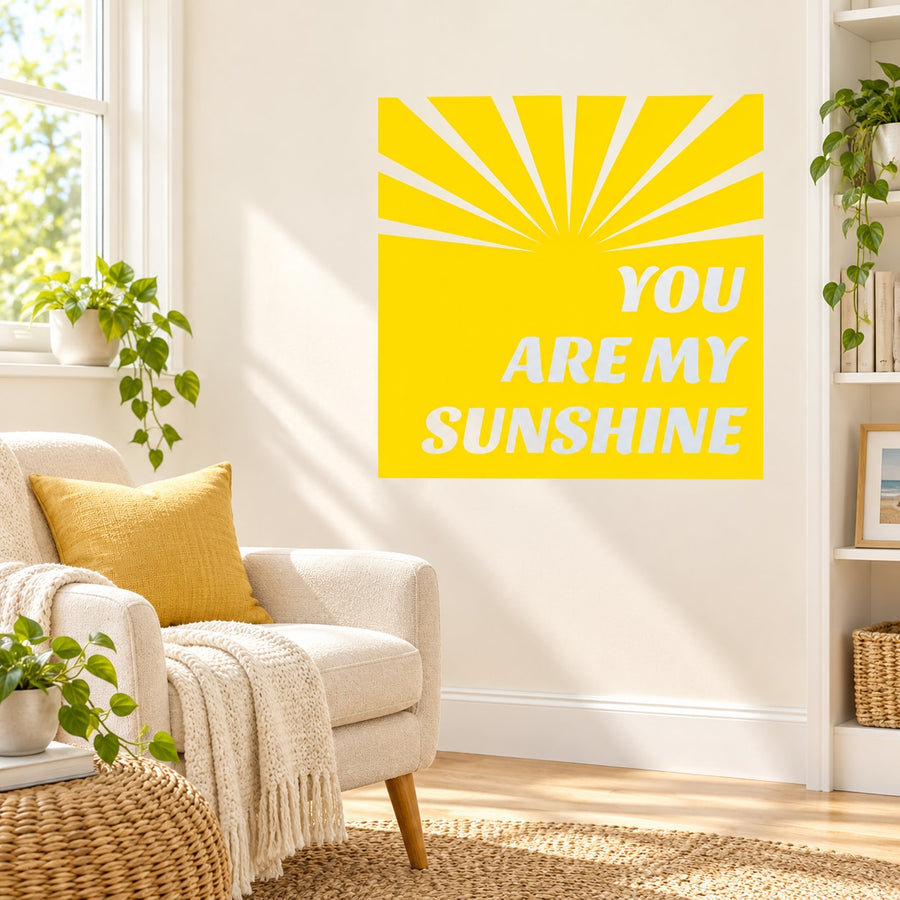 Yellow wall decal with sunburst rays and the text “YOU ARE MY SUNSHINE”