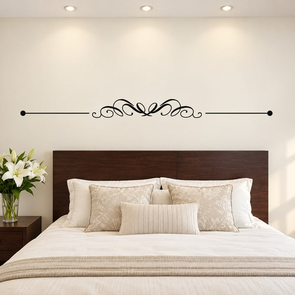 Wedding script wall decal with ornate flourish design above bed