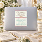 Wedding invitation card with floral border and “Wedding Invitation” script text