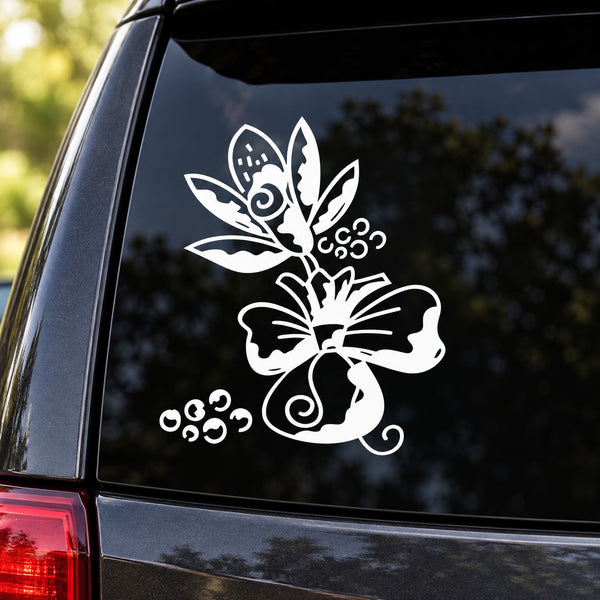 White floral wedding decal with leaves and swirl accents on a car window