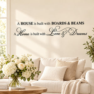 Wedding quote wall decal with "A house is built with boards & beams" lettering
