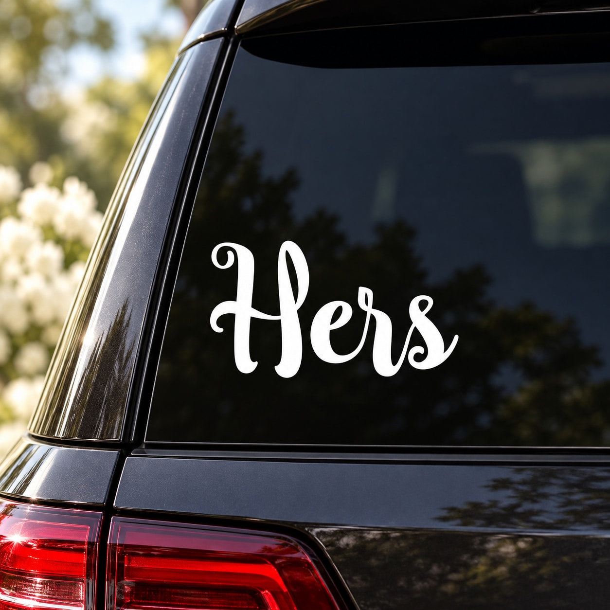 Car window decal with white script 'Hers'