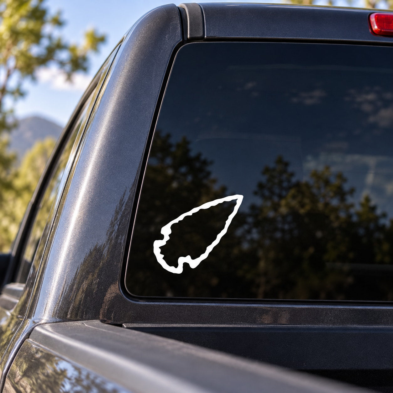 Arrowhead pointing right decal, white arrowhead icon on vehicle window