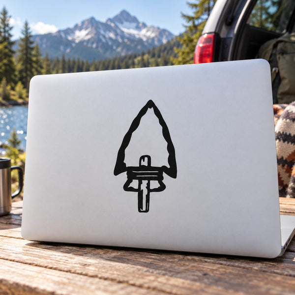 Arrowhead notched to a stick decal with black arrow symbol on white backing