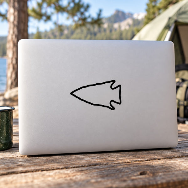 Left-pointing arrow outline decal on white rectangle