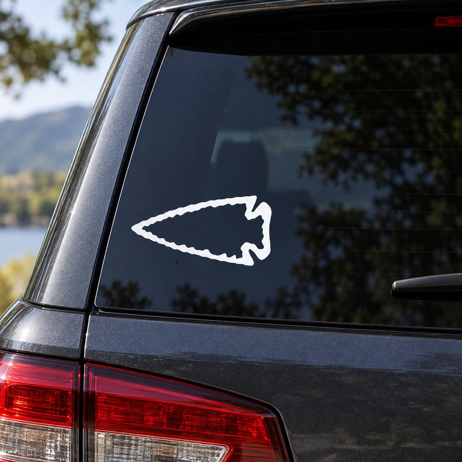 White left-pointing arrow wall decal sticker on a surface