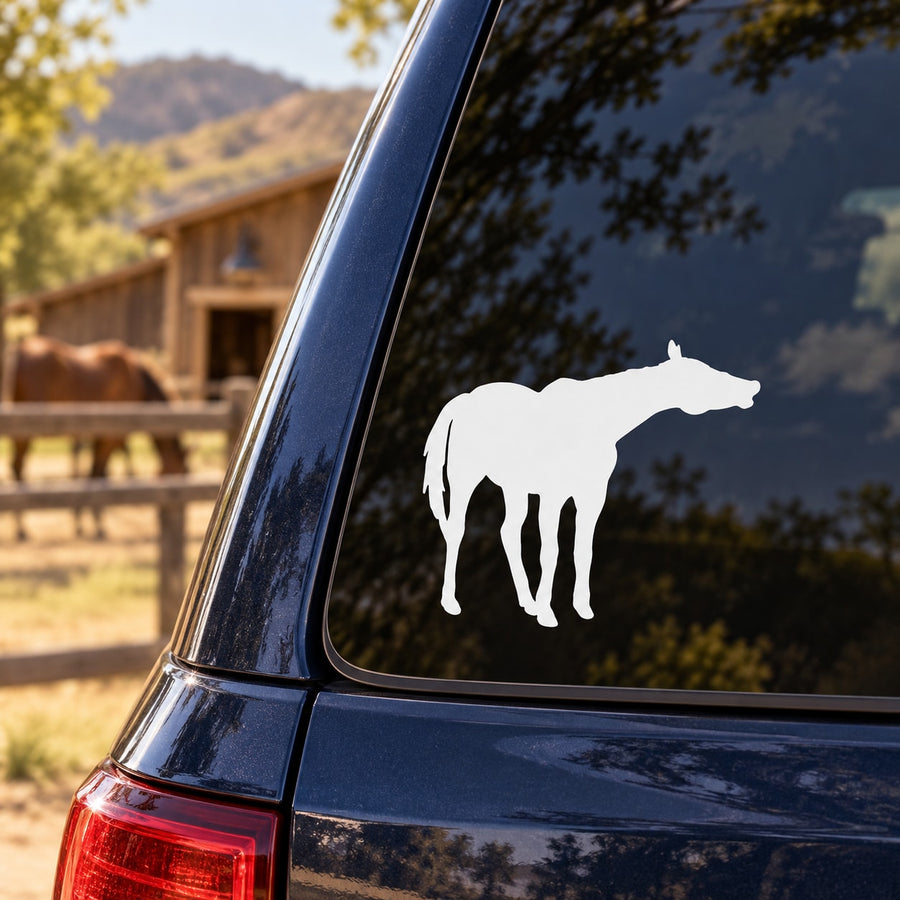White neighing horse decal silhouette on dark blue car panel