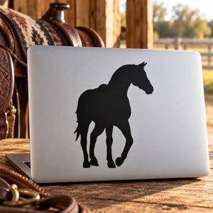 Black horse silhouette decal on light rectangular surface
