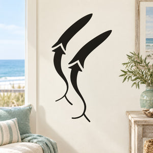 Abstract whale decal with two black stylized sperm whale silhouettes