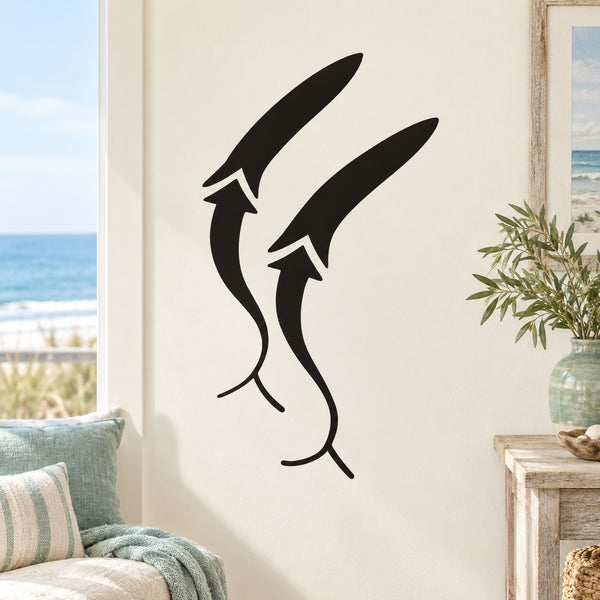 Abstract whale decal with two black stylized sperm whale silhouettes