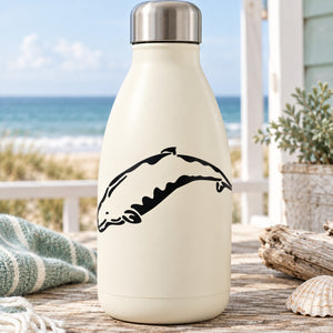 Smiling beluga whale decal on cream water bottle