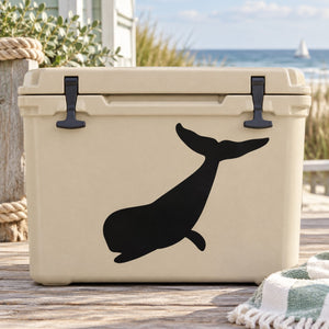 Black diving beluga whale decal sticker on a beige cooler