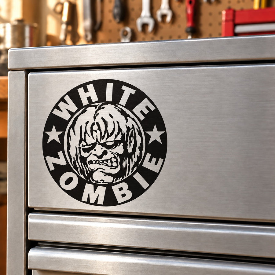 Circular logo decal with black background, white text, and skull graphic