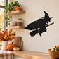 Black silhouette witch riding a broom wall decal