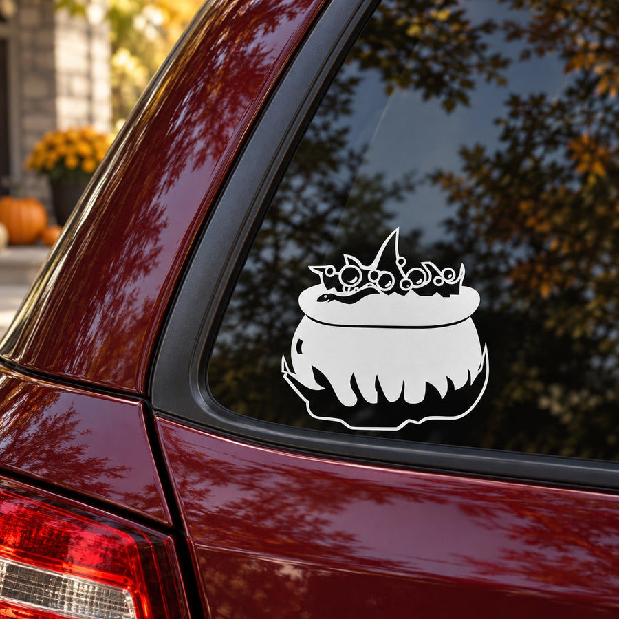 White boiling cauldron on fire car decal with small flames above the pot