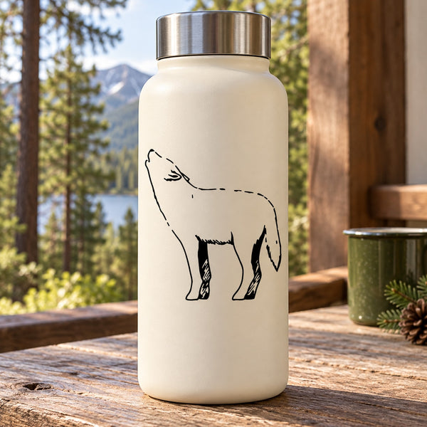 Wolf howling line-art decal on a light-colored bottle