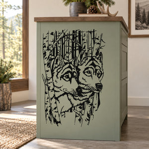 Black forest wolf heads decal with two peeking faces and tree line art