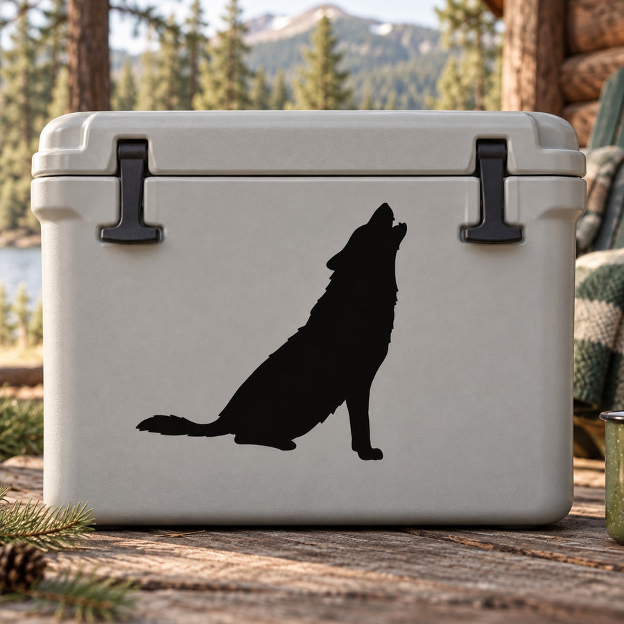 Black sitting wolf howl decal silhouette on a light gray surface