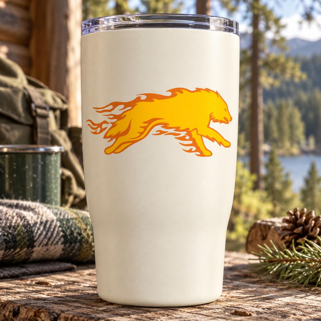 White insulated tumbler with clear lid and orange flaming wolf graphic decal