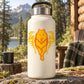 Orange wolf sticker with fire wings on cream water bottle