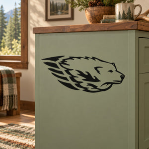 Dashing wolf head decal with black wolf head silhouette on light green cabinet door