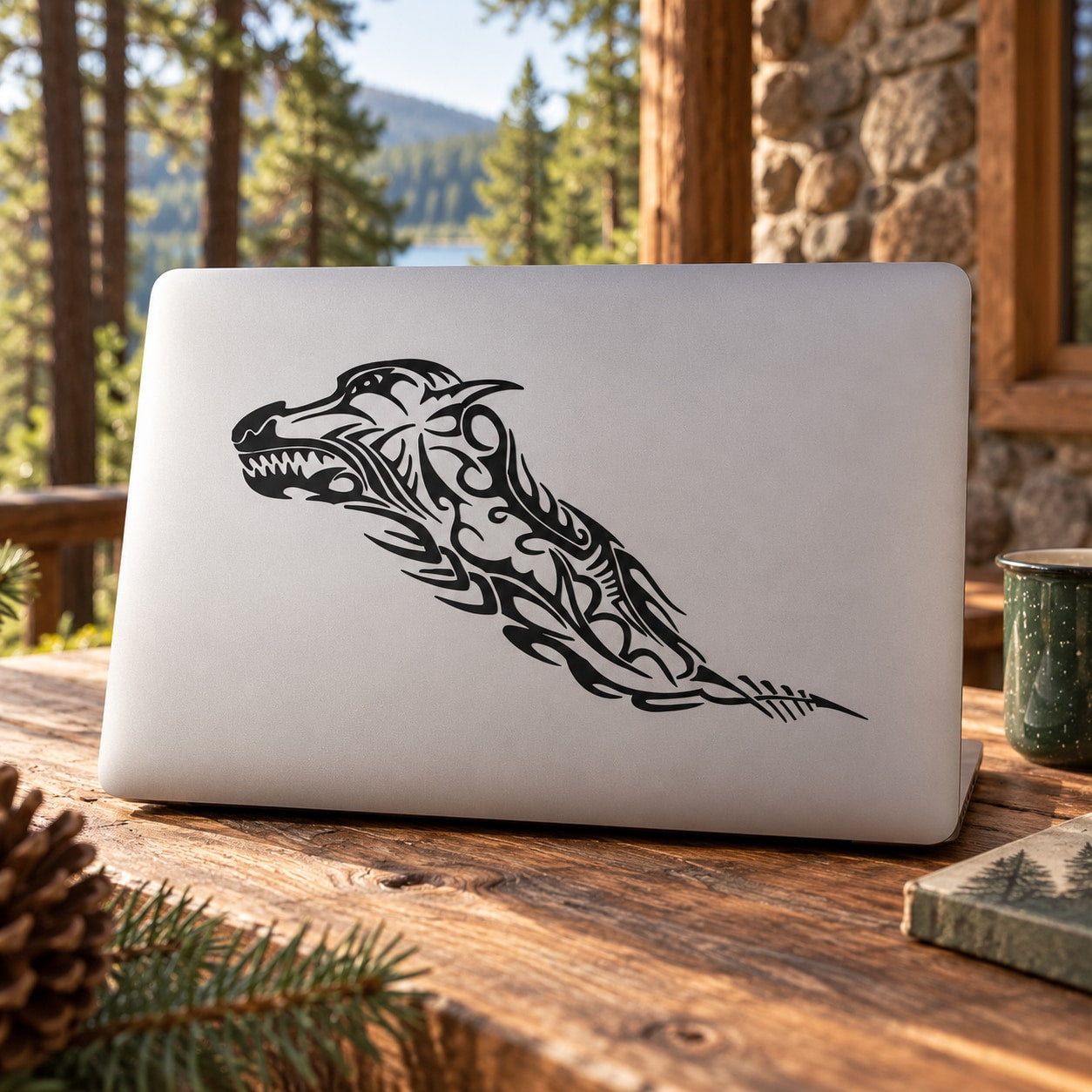Tribal wolf decal sticker with black tribal pattern on white laptop lid