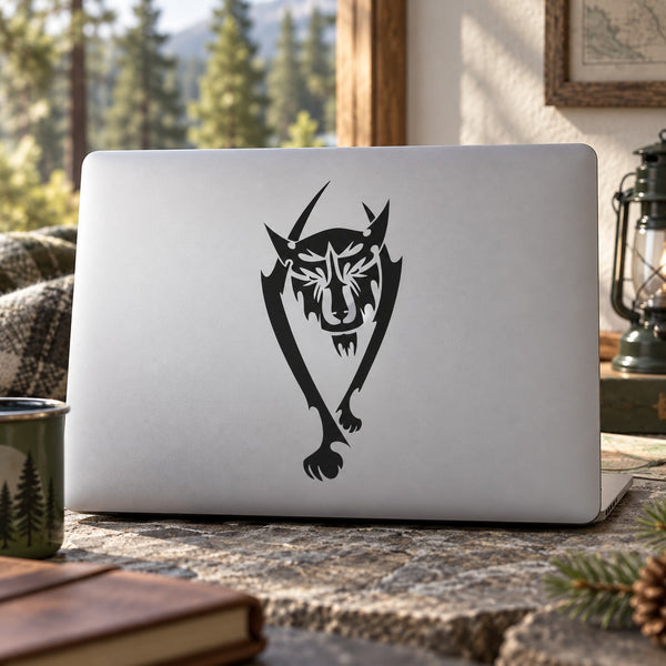 Abstract walking wolf decal with black graphic on a laptop lid