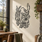 Black outlined hissing cat decal with flame accents on a light surface