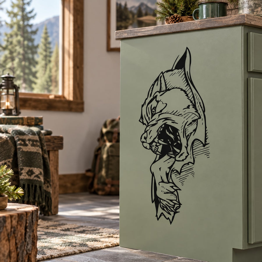 Wolf tearing graphic decal on cabinet door, black outline.