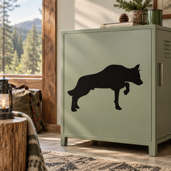 Black wolf decal showing a sniffing wolf silhouette on a cabinet door