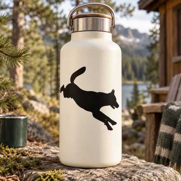 White bottle with black jumping wolf silhouette decal