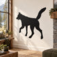 Wolf silhouette decal with raised paw, black outline on a wall