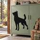 Black wolf silhouette wall decal, facing left with raised tail and upright ears.