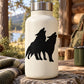 Water bottle with two wolves howling silhouette decal, black on white